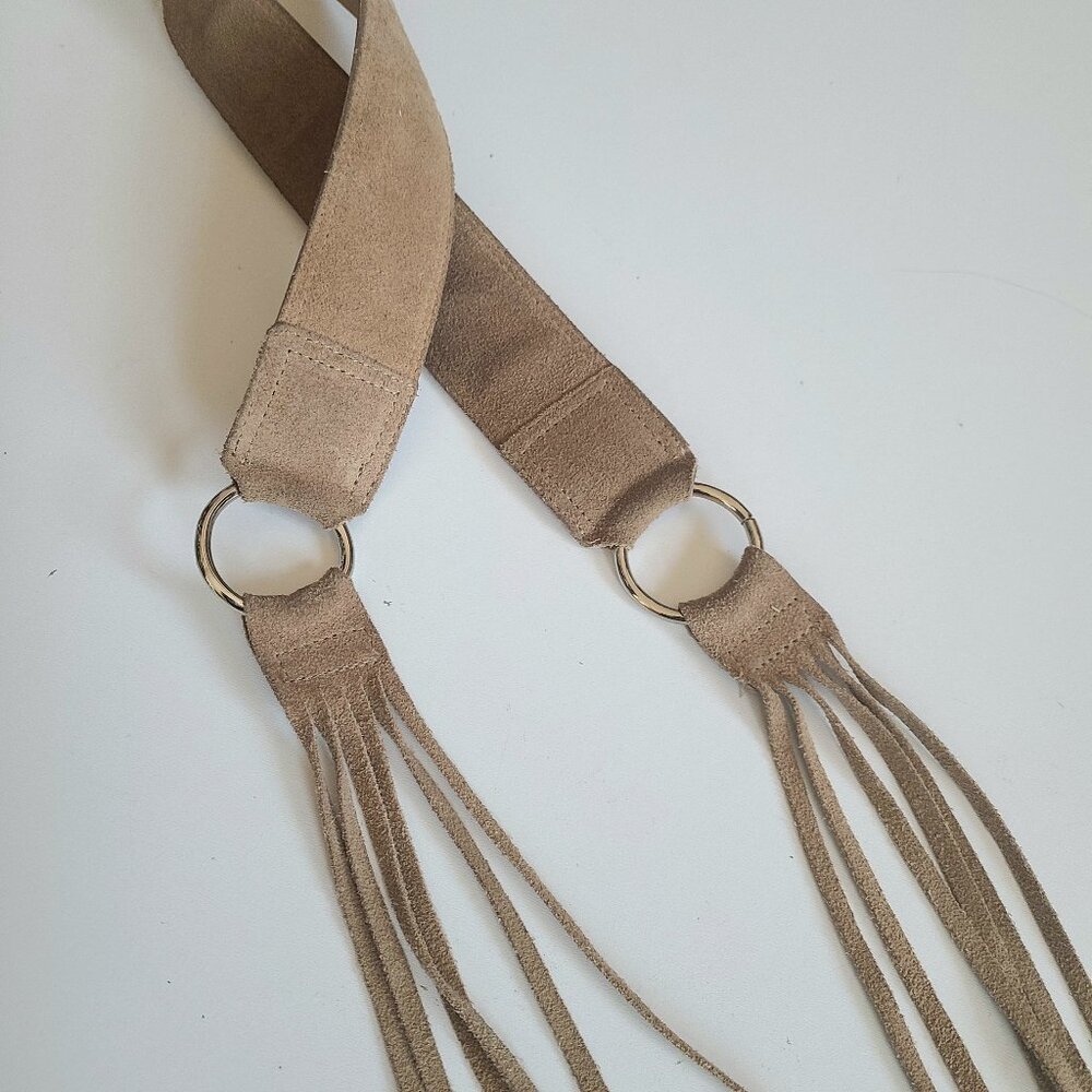 Brody Genuine Leather beige belt with tassels.